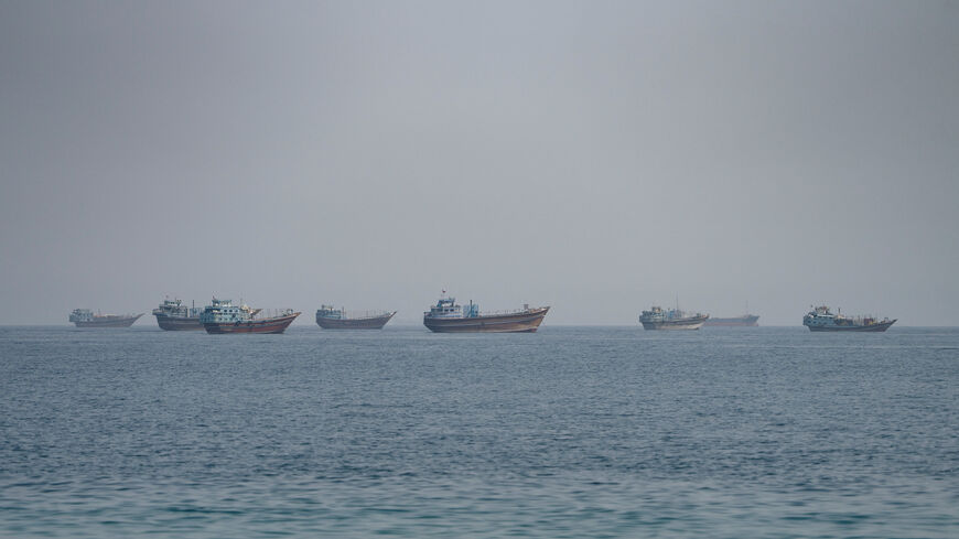 Vessels near the Strait of Hormuz, as seen from Musandam, Oman, August 24, 2026. REUTERS/Stringer