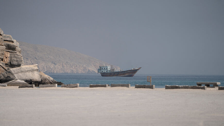 A vessel near the Strait of Hormuz, as seen from Musandam, Oman, August 24, 2026. REUTERS/Stringer