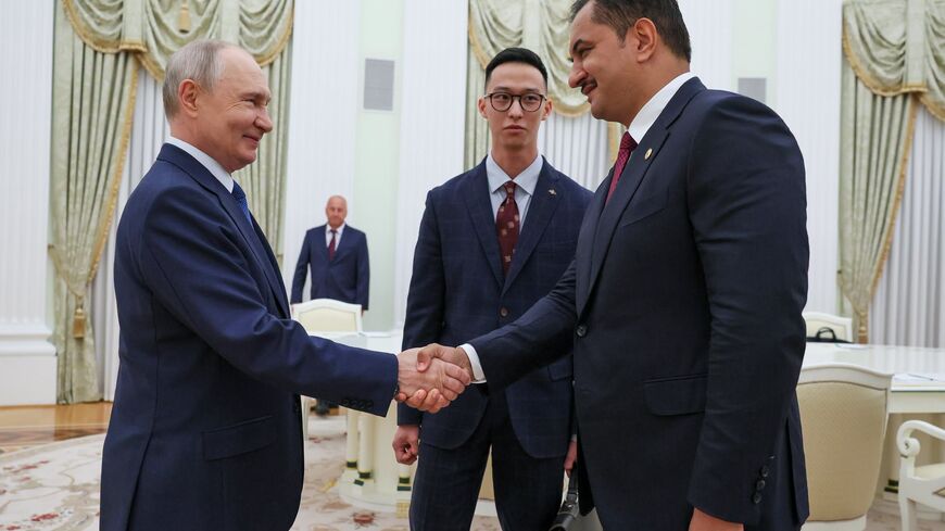 Saddam Hifter meets with Vladimir Putin at the Kremlin
