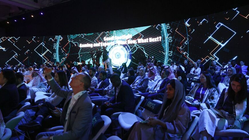 People attend the international esports gamers Next World Forum in Riyadh, Sept. 7, 2022. 