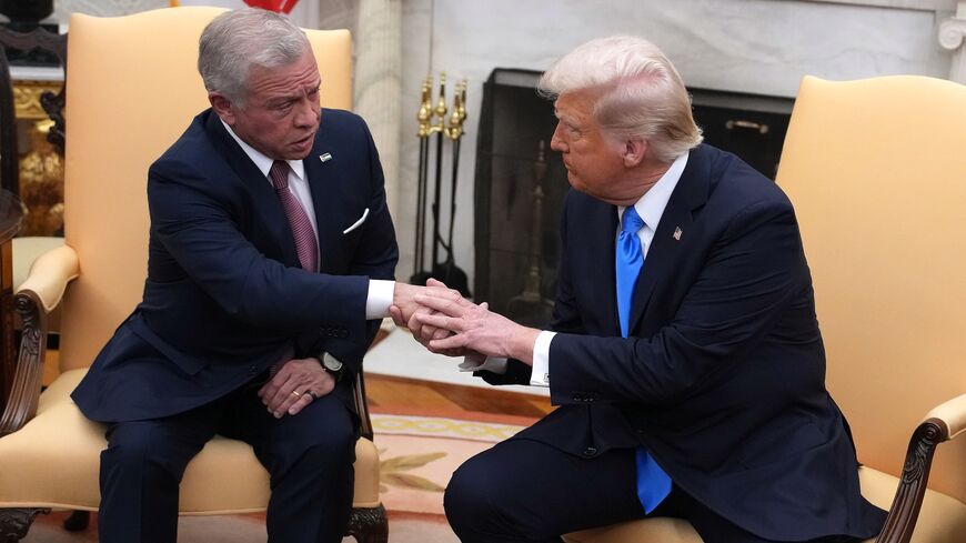 US President Donald Trump (R) meets with Jordanian King Abdullah II in the Oval Office of the White House, Washington, DC, Feb. 11, 2025.