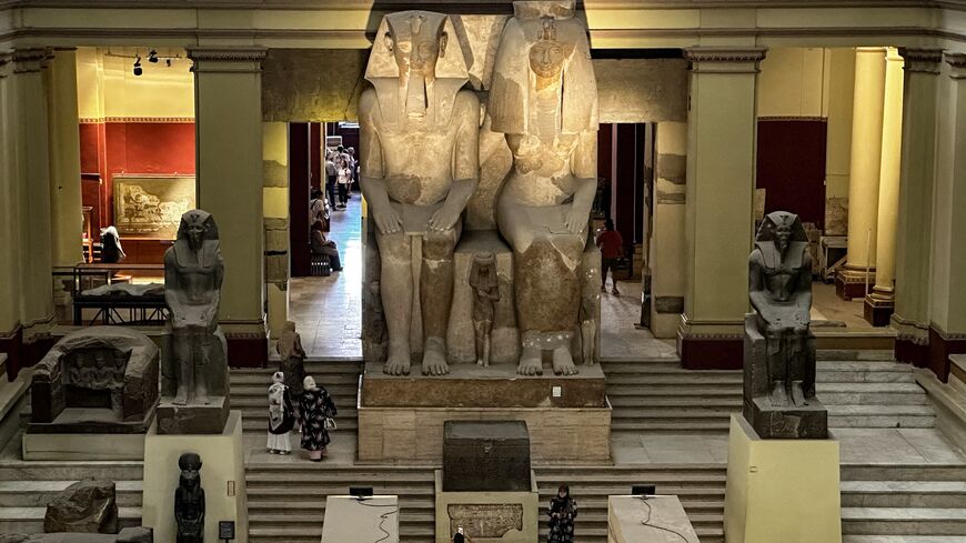 The 26-feet-tall statues of the ancient Egyptian King Amenhotep III (1391-53 BC), father of Amenhotep IV (Akhenaten) and probably grandfather of Tutankhamun, and his consort queen, Tiye, at the Egyptian Museum, Tahrir Square, Cairo, June 11, 2025.