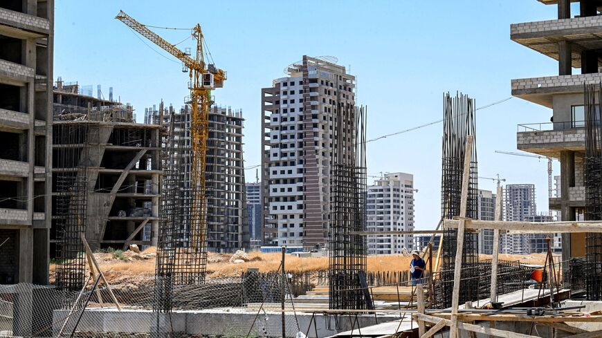 Ongoing construction work is pictured at a site in Marota City, a new mixed-use development project near the Umayyad Square in Damascus on July 22, 2026. Syria's new leaders, who inherited a dilapidated economy, are trying to attract capital without waiting for the full lifting of international sanctions. (Photo by LOUAI BESHARA / AFP via Getty Images)