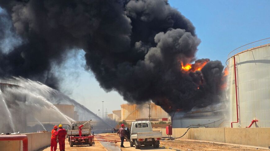 Libyan firefighting teams attempt to extinguish a fire at the Zawiya refinery, in Zawiya, Libya, on Aug. 11, 2026. — Mahmud Turkia / AFP via Getty Images