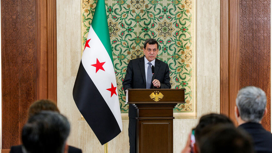 Mazlum Kobane, leader of the Kurdish-led Syrian Democratic Forces, speaks during a televised speech at the People's Palace in Damascus on Aug. 25, 2026. — Bakr ALkasem / AFP via Getty Images