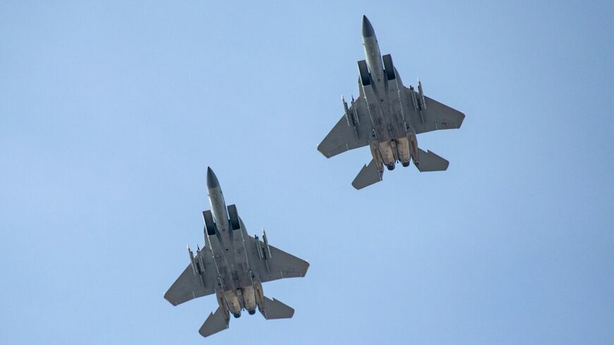 F-15 Eagle fighter jets fly over the race course during the 129th Boston Marathon on April 21, 2025, in Boston, Massachusetts. Four F-15s fighters have been destroyed during the US war against Iran, according to the Defense Department's inspector general.