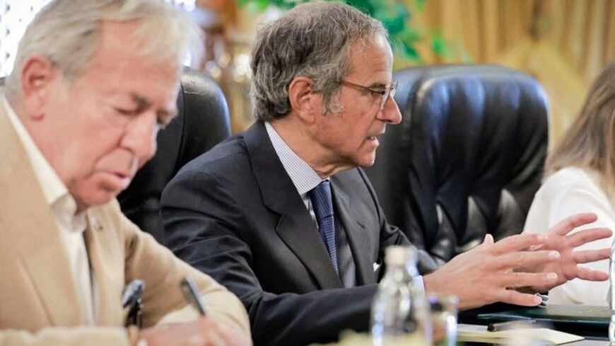 A SANA picture showing IAEA Director General Rafael Grossi meeting with Syria's interim foreign minister in Damascus last month ahead of the report findings