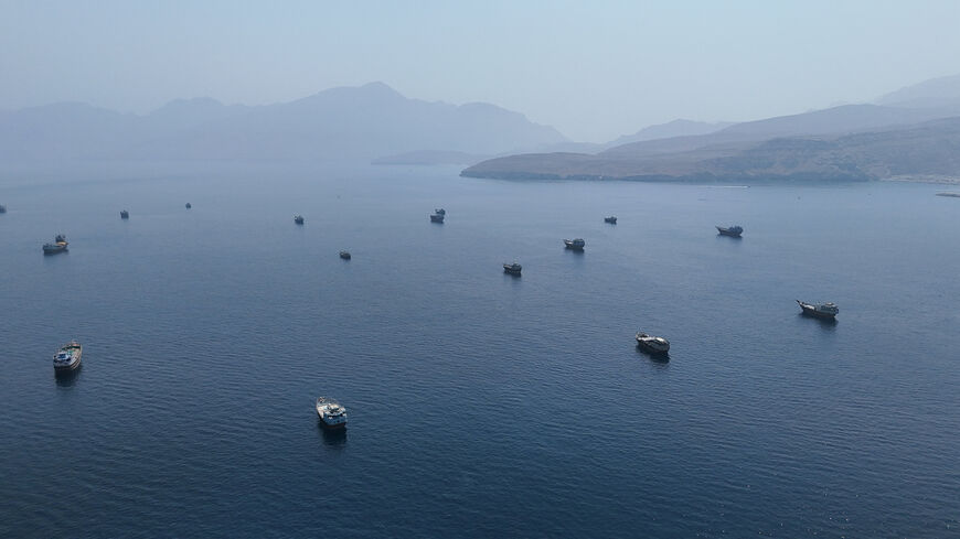 FILE PHOTO: A drone view shows vessels near the Strait of Hormuz, as seen from Musandam, Oman, August 28, 2026. REUTERS/Stringer/File Photo