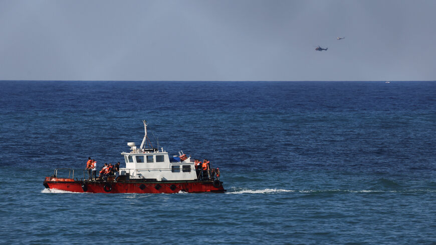 Rescue vessels evacuate people from a passenger boat that capsized off the coast of Kyrenia, in the Turkish-controlled northern Cyprus, August 30, 2026. REUTERS/Yiannis Kourtoglou