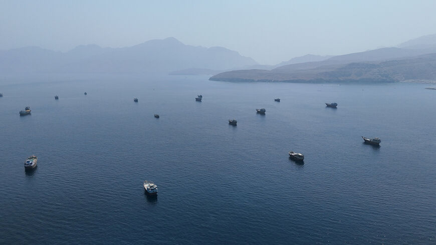 FILE PHOTO: A drone view shows vessels near the Strait of Hormuz, as seen from Musandam, Oman, August 28, 2026. REUTERS/Stringer/File Photo
