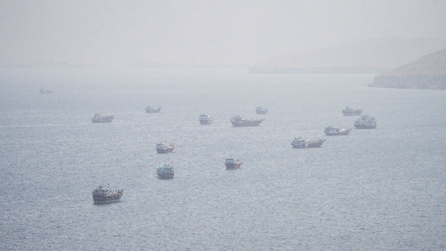 FILE PHOTO: Vessels near the Strait of Hormuz, as seen from Musandam