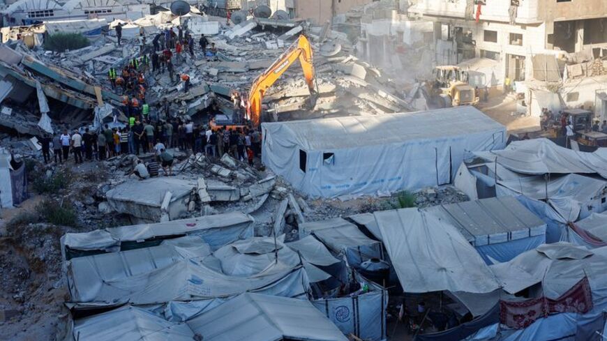 War-damaged building collapses in Gaza City