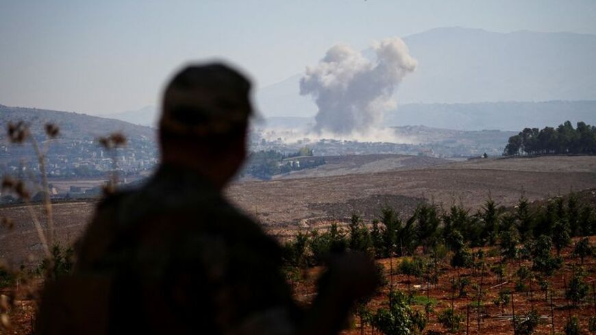 FILE PHOTO: Smoke rises in southern Lebanon following an Israeli strike, as seen from Zawtar al-Gharbiyeh