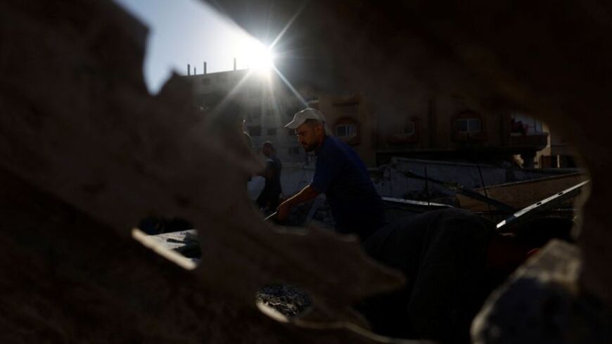 War-damaged building collapses in Gaza City