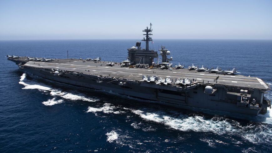 In this handout released by the US Navy on July 15, 2010, the aircraft carrier USS Theodore Roosevelt (CVN 71) transits the Pacific Ocean. 