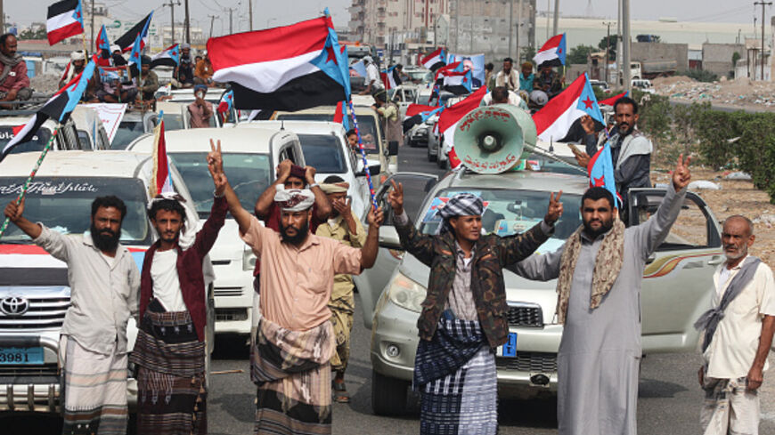 Yemenis gather during a rally to show their support for the UAE-backed Southern Transitional Council (STC) in the coastal port city of Aden, on December 14, 2025. (Saleh Al-OBEIDI / AFP via Getty Images)