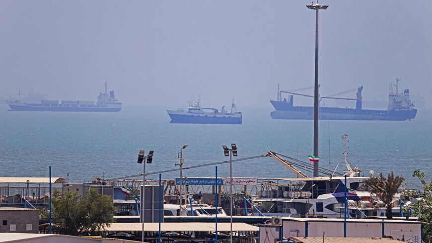In this picture obtained from Iran's ISNA news agency on June 18, 2026, vessels are seen anchored in Bandar Abbas along the Strait of Hormuz. 