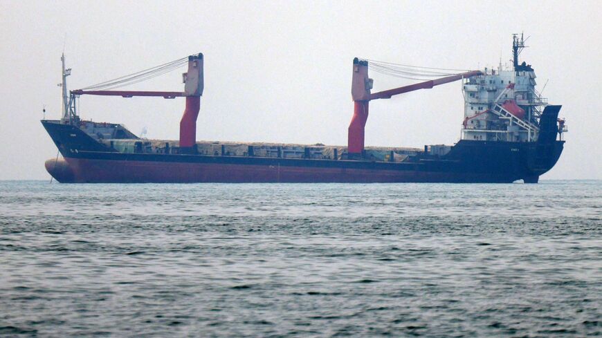 A shipping vessel transits the Strait of Hormuz