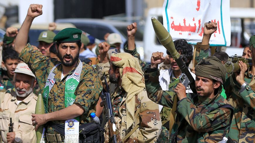Fighters loyal to the Houthi authorities shout slogans during a rally to recruit more fighters, in Sanaa, Yemen, on Sept. 10, 2026.