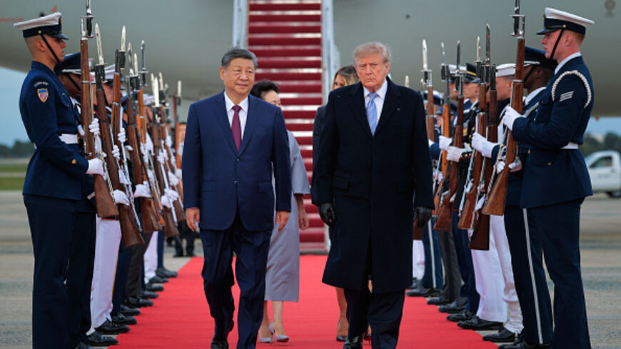 OINT BASE ANDREWS, MARYLAND - SEPTEMBER 23: U.S. President Donald Trump (R) walks on a red carpet after greeting Chinese President Xi Jinping (L) during an arrival ceremony on September 23, 2026 at Joint Base Andrews, Maryland. President Trump is hosting President Xi for a three-day state visit to Washington, DC where the leaders are expected to discuss trade practices, artificial intelligence and furthering “strategic stability” between their countries. (Photo by Chip Somodevilla/Getty Images)