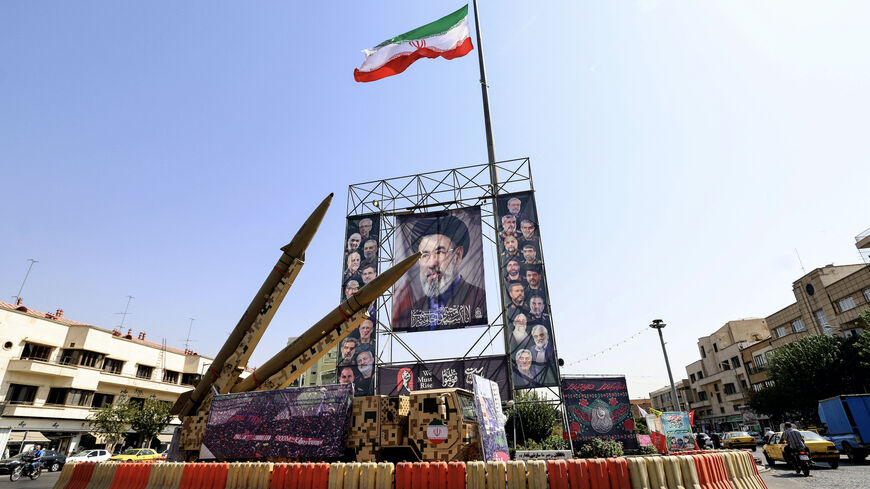 Iranian-made Zolfaghar missiles are seen on display beside a large portrait of Iran's supreme leader Mojtaba Khamenei at Baharestan Square in Tehran on Sept. 28, 2026. 