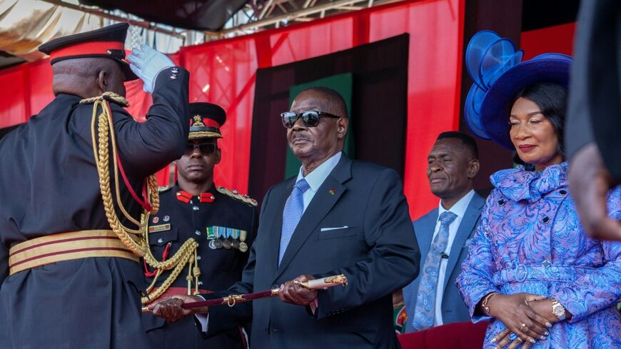 General Paul Valentino Phiri (L) was head of Malawi's armed forces from July 2023 until October 2025