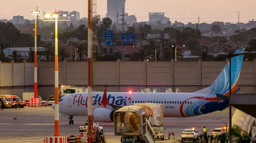 A flydubai Boeing 737 MAX 8 aircraft is pictured on the tarmac after landing at Israel's Ben Gurion Airport on Wednesday