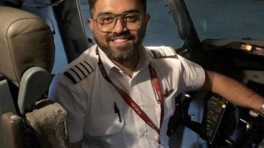 Indian pilot Smit Machchhar smiles in an unidentified location