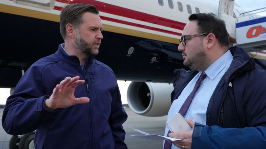 US Vice President JD Vance is interviewed by Reuters reporter Jacob Bogage before a campaign rally at Fairbanks International Airport in Fairbanks