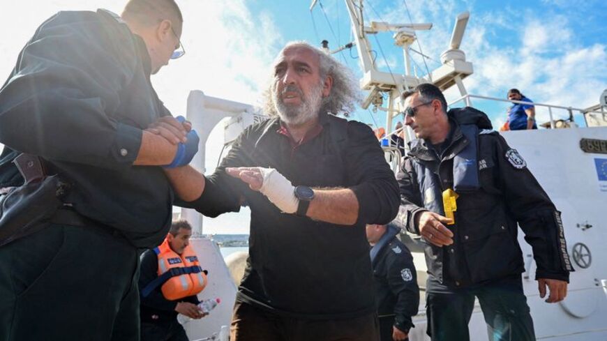 Crew members from a ship damaged in a drone attack are being rescued in Varna