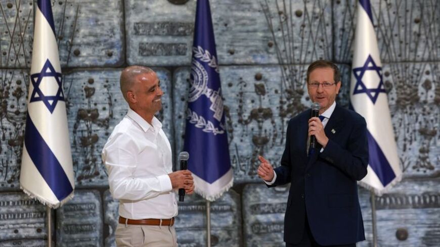 Israeli President Herzog presents heroism award to Israelis who intervened after FlyDubai aircraft pilot was attacked with an axe, in Jerusalem