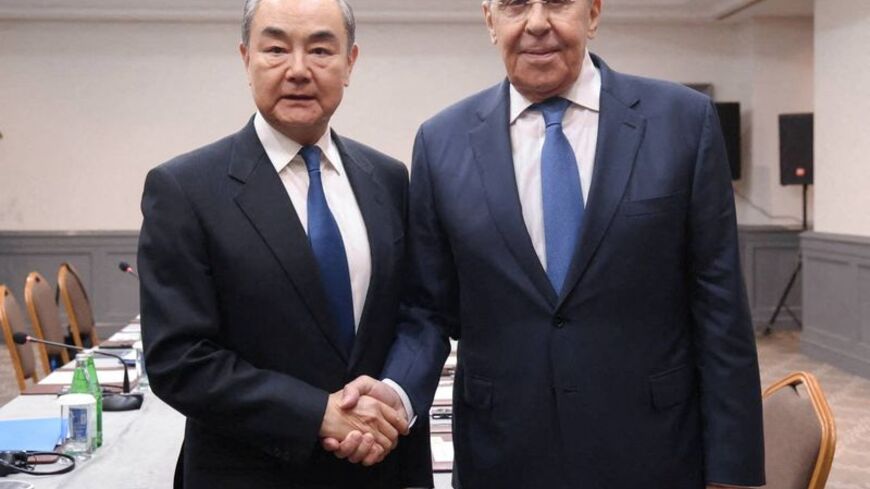Russia's Foreign Minister Sergei Lavrov and China's Foreign Minister Wang Yi meet in Baku