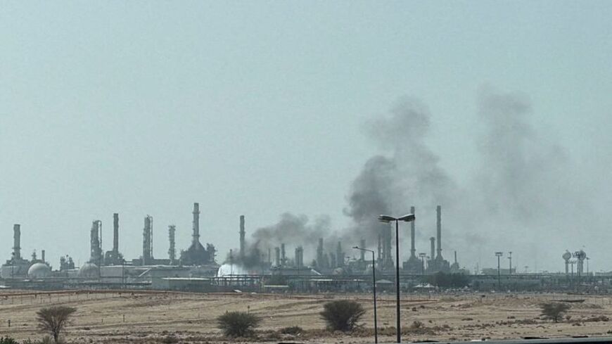 FILE PHOTO: Smoke rises from a fire at the Aramco refinery south of Riyadh