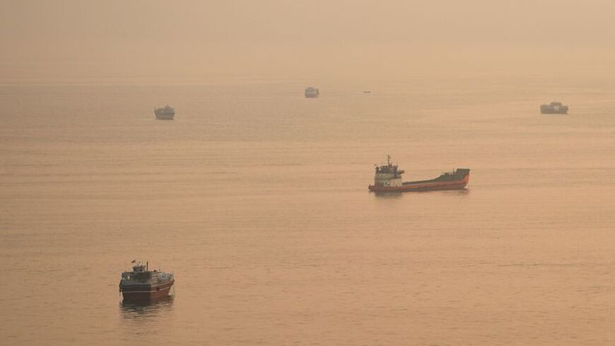 FILE PHOTO: Vessels at the Strait of Hormuz, as seen from Musandam