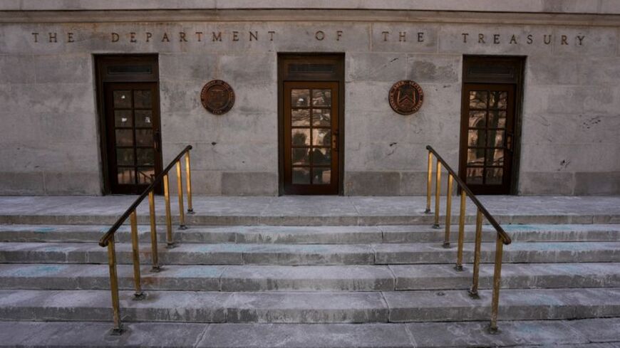 FILE PHOTO: US Department Of The Treasury on day two of a partial government shutdown in Washington