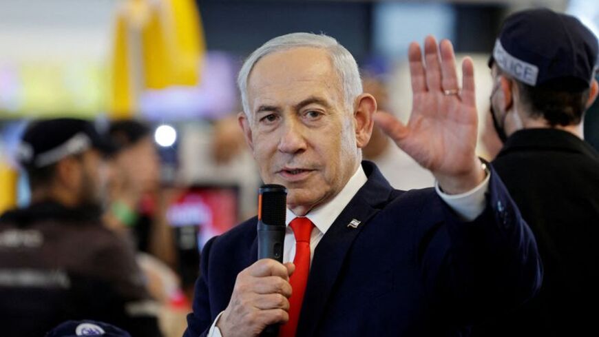 FILE PHOTO: Israeli Prime Minister Benjamin Netanyahu meets members of the public in Ramla