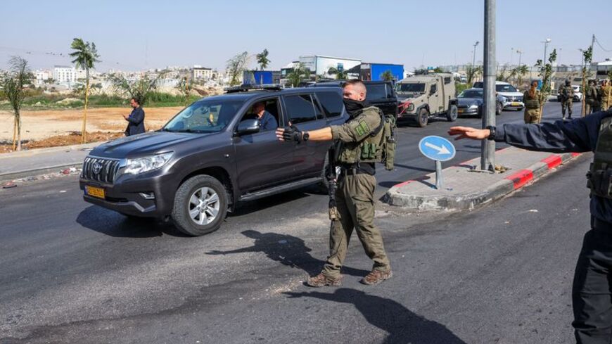 Israeli forces stand guard near shooting scene in Hebron in the Israeli-occupied West Bank