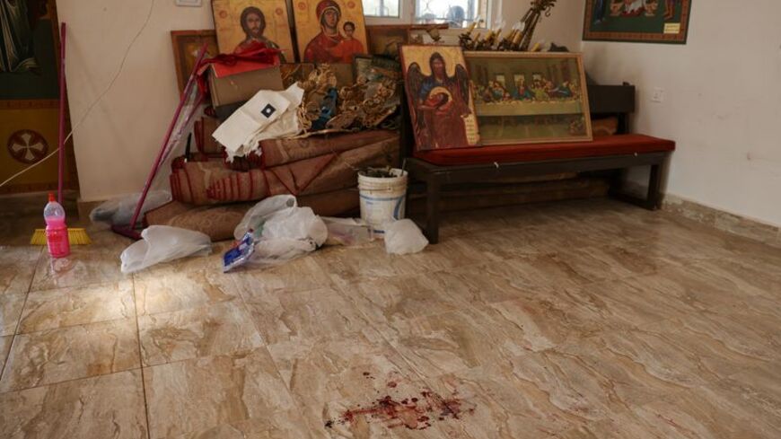 The grounds of Saint George’s Greek Orthodox Church, where gunmen opened fire during a funeral the previous day, in the village of Hamoud