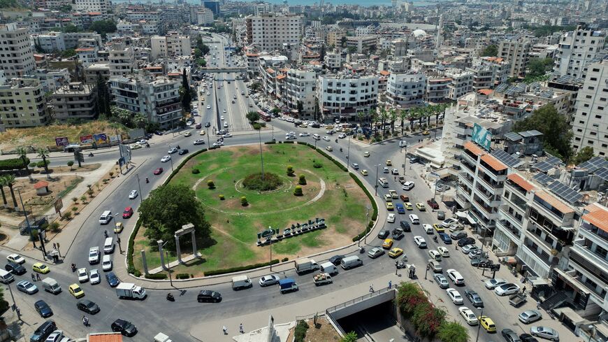 A view of a traffic roundabout in central Latakia, Syria on June 12, 2025. The city's road network converges near the coast, forming one of the busiest urban intersections in the province. (Photo by Omar Albaw / Middle East Images via AFP) (Photo by OMAR ALBAW/Middle East Images/AFP via Getty Images)