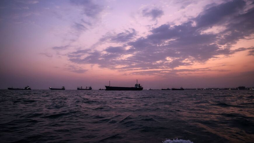 Vessels transit the Strait of Hormuz off the coast of the port city of Bandar Abbas in southern Iran