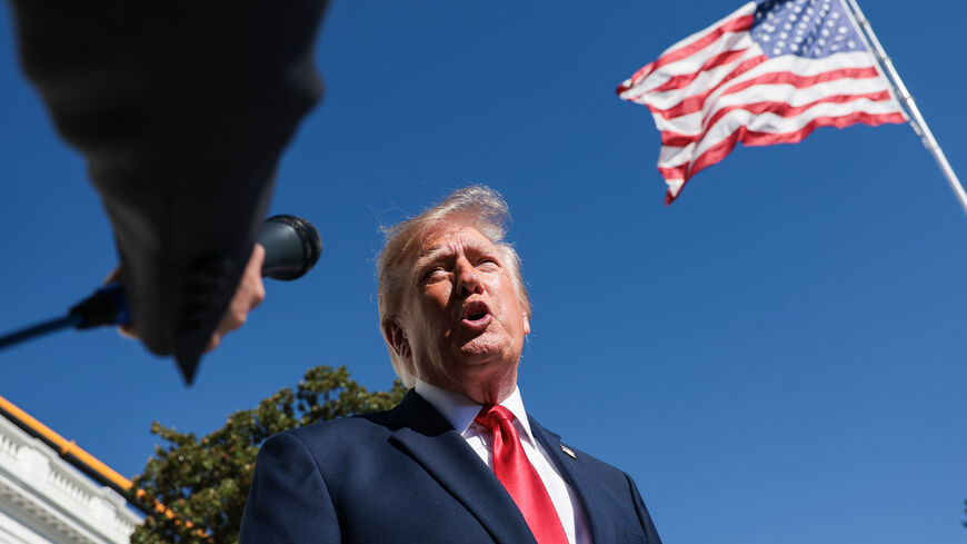 President Donald Trump speaks to reporters before boarding Marine One on the South Lawn of the White House on Oct. 7, 2026 in Washington, DC. 