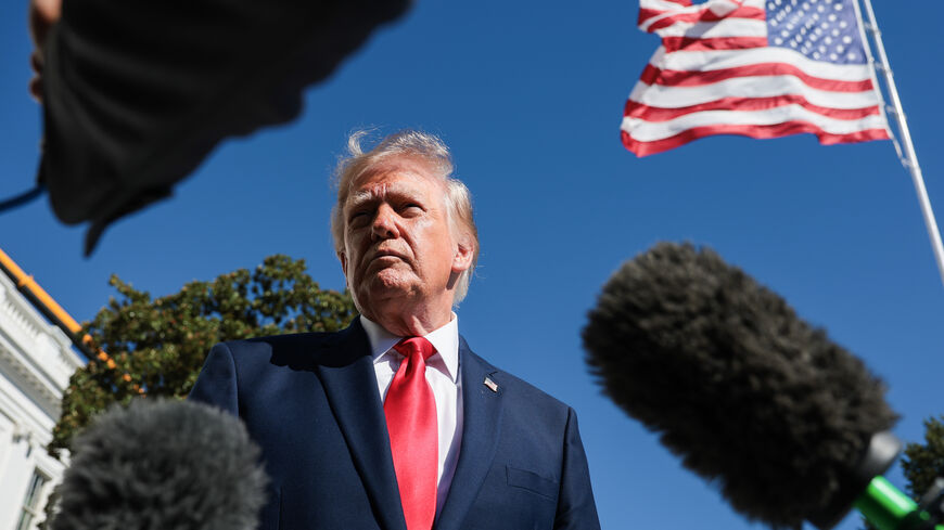 President Donald Trump speaks to reporters before boarding Marine One on the South Lawn of the White House on Oct. 7, 2026 in Washington, DC. 
