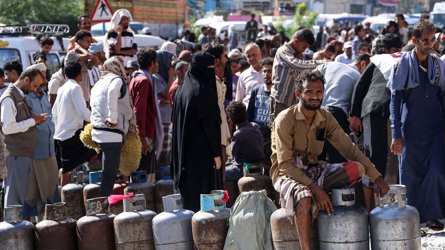 Yemenis line up to refill gas bottles at a refilling station in Taiz, on Oct. 19, 2026.