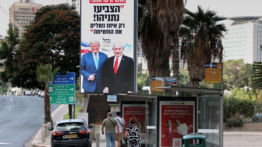 billboard featuring Israeli Prime Minister Benjamin Netanyahu and US President Donald Trump