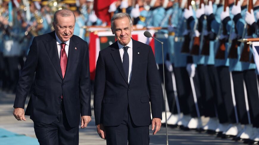 Turkish President Recep Tayyip Erdogan welcomes Canadian Prime Minister Mark Carney