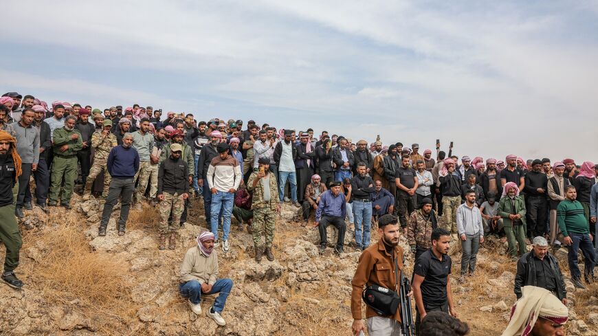 Mourners attend the funeral of those who were killed in airstrikes carried out by Jordan the night before on the village of Al-Taf in the Al-Lajat region, located in the northeastern countryside of Daraa, on Oct. 27, 2026. 