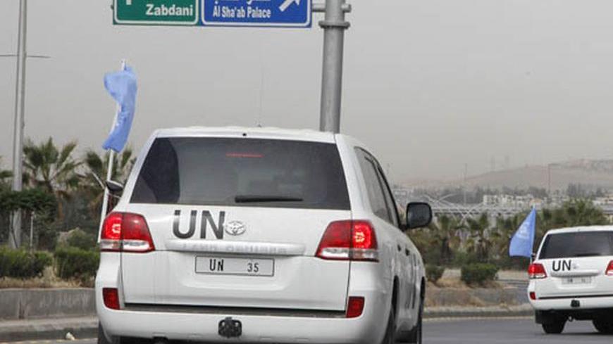 United Nations observers travelling in U.N. vehicles leave a hotel in Damascus May 1, 2012, as they head to areas where protests against the regime of Syrian President Bashar al-Assad have been taking place. REUTERS/Khaled al- Hariri (SYRIA - Tags: CIVIL UNREST MILITARY POLITICS CONFLICT)