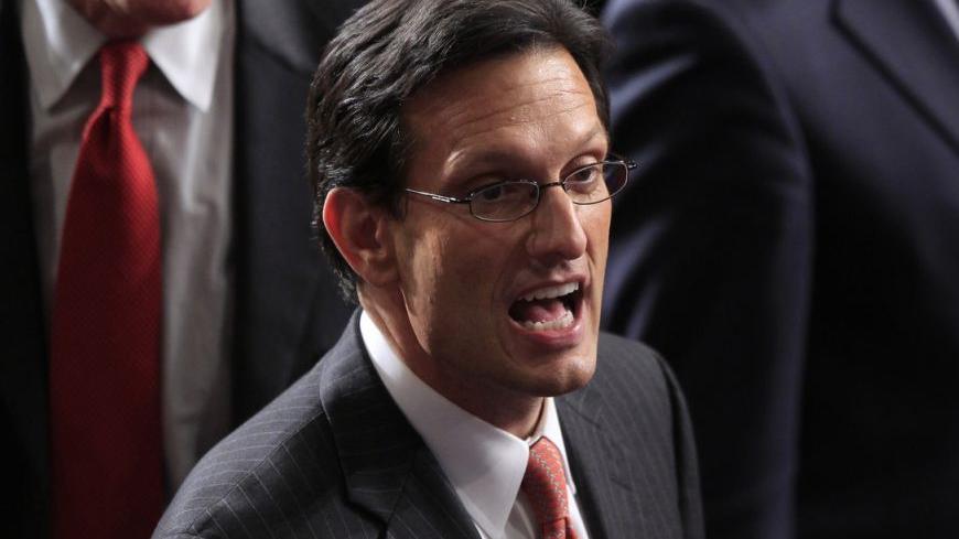 House Majority Leader Eric Cantor, R-VA, arrives in the House chamber in advance of U.S. President Barack Obama's State of the Union address to a joint session of Congress on Capitol Hill in Washington, January 24, 2012. REUTERS/Jason Reed (UNITED STATES  - Tags: POLITICS)