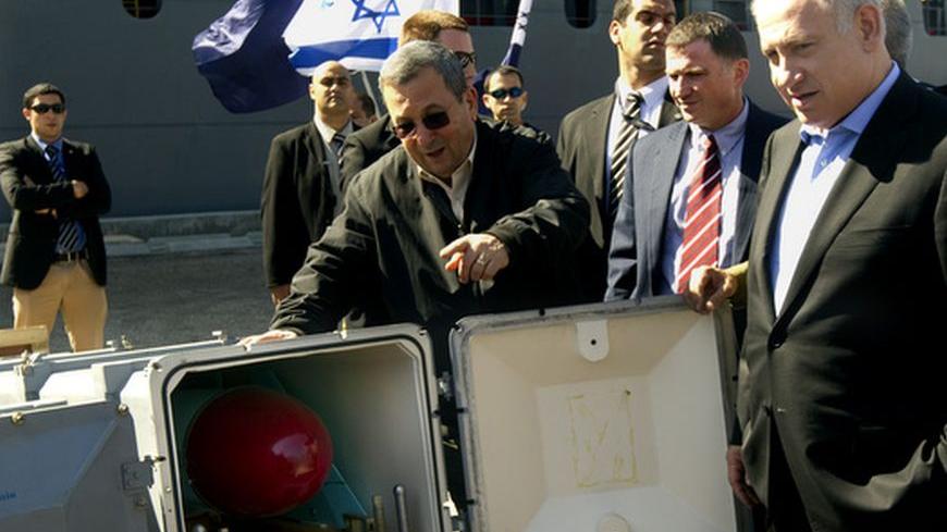 Israeli Prime Minister Benjamin Netanyahu (R) and Defence Minister Ehud Barak examine a C-704 anti-ship missile at the southern port of Ashdod on March 16, 2011 as Israel displayed the haul of weapons it discovered on a seized ship it says was carrying arms being smuggled from Iran to Palestinian militants in the Gaza Strip. AFP PHOTO /JACK GUEZ (Photo credit should read JACK GUEZ/AFP/Getty Images)