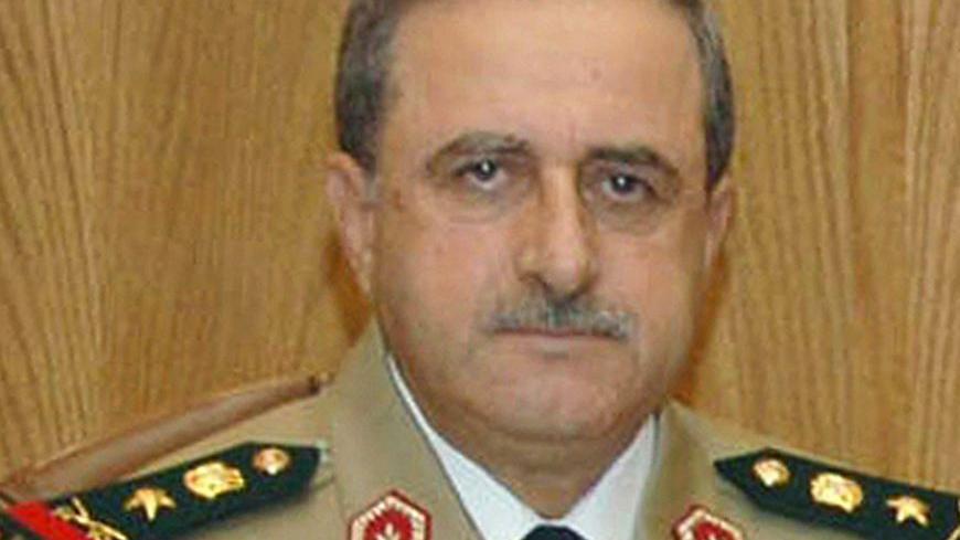 Syrian Defence Minister Daoud Rajha is seen in an undisclosed location in this undated file handout distributed by Syrian News Agency (SANA) on July 18,2012. Daoud Rajha was killed by a bomb which exploded during a meeting of ministers and security officials at a national security building in Damascus on July 18, 2012, state television said. REUTERS/Sana/Files  (SYRIA - Tags: CIVIL UNREST MILITARY POLITICS CONFLICT OBITUARY) THIS IMAGE HAS BEEN SUPPLIED BY A THIRD PARTY. IT IS DISTRIBUTED, EXACTLY AS RECEIV
